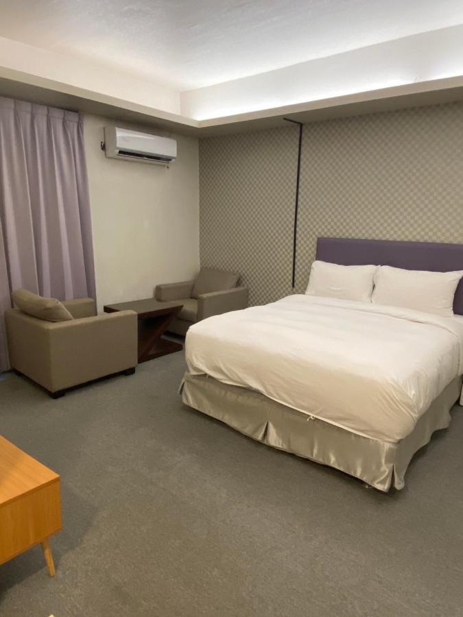 Aiyue Hotel Huwei Екстериор снимка